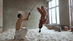 Bondage in the sand Thumb
