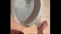 Pissing in toilet Thumb