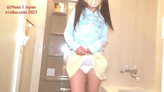 Shyness of short shaved pussy NANA, peeing in diaper Thumb