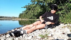 Jon Arteen wanks outdoor on a pebbles beach, the sexy twink wearing short shorts cums on his thigh,  Thumb
