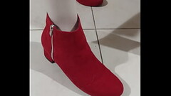 She in red boots Thumb