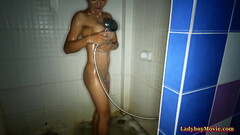 Ladyboy washes out the sperm from her ass Thumb
