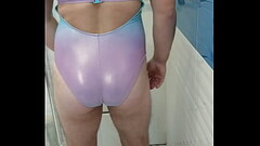 Boy in shiny swimsuit Thumb
