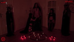 Something very strange happened during a satanic ritual, a candle lit by itself! Thumb